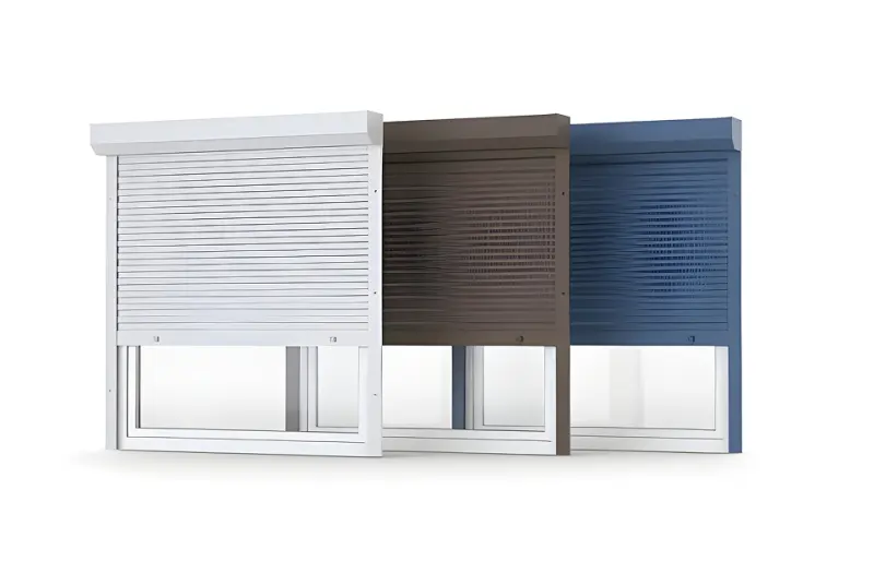 Drei Rollladenkästen in Weiß, Braun und Blau über Fenstern